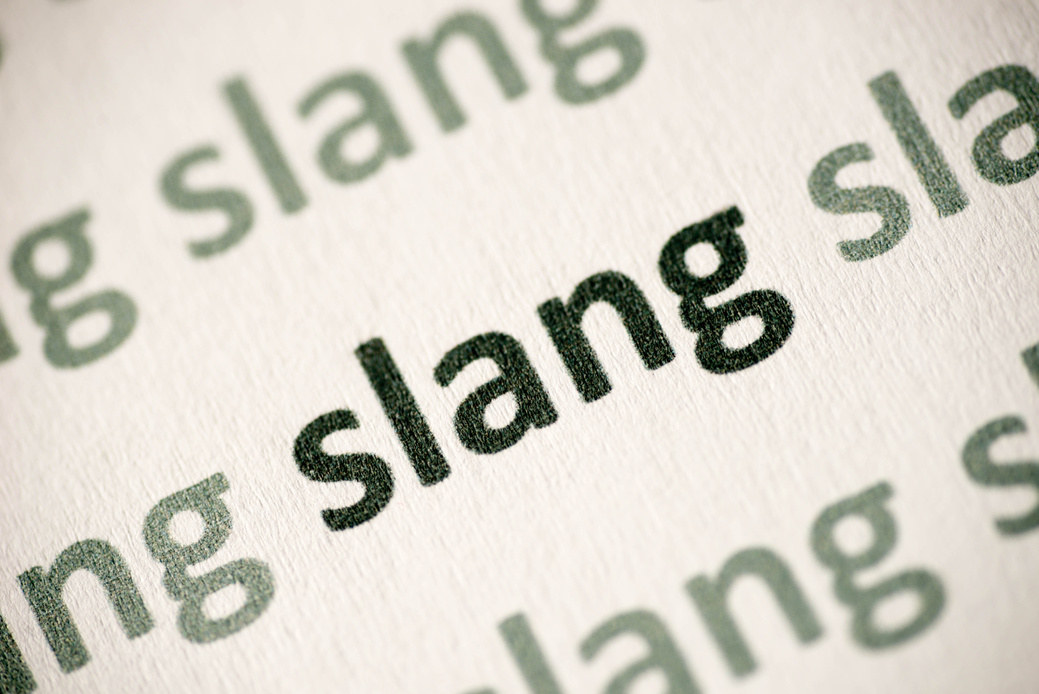 word slang printed on paper macro